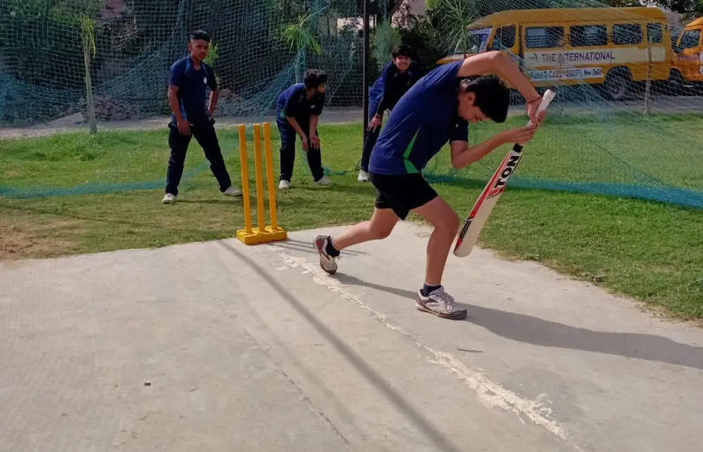 Agra school students playing crickate in tisa ground